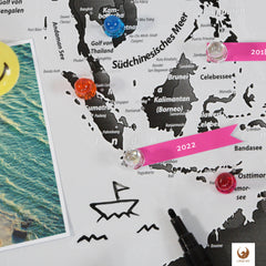 Markierungsfähnchen, Fotos, Magnete, Stifte - nutze verschiedenes Zubehör und dekoriere deine Weltkarte als Magnetboard.